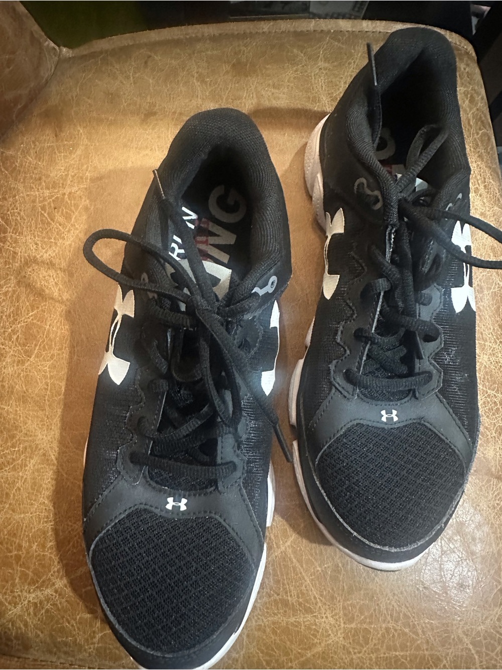 Under Armour Black and White Athletic Sneakers for men and women